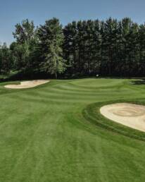 Muskoka golf green with two bunkers