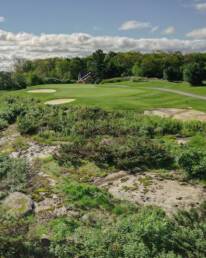 Muskoka golf green with two bunkers